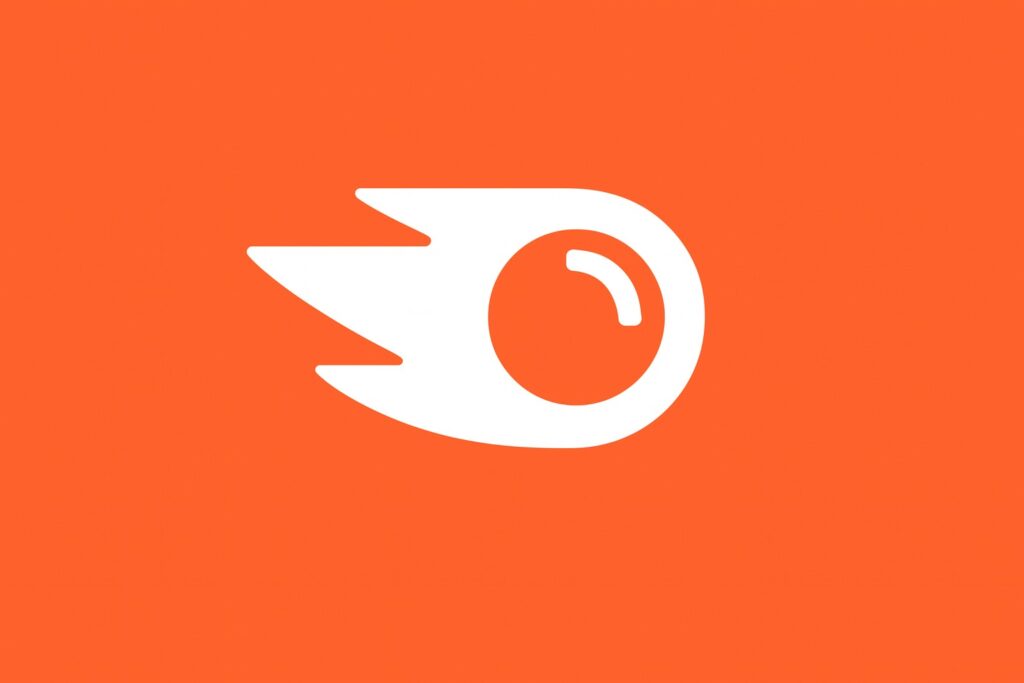SEMrush white comet-shaped logo.